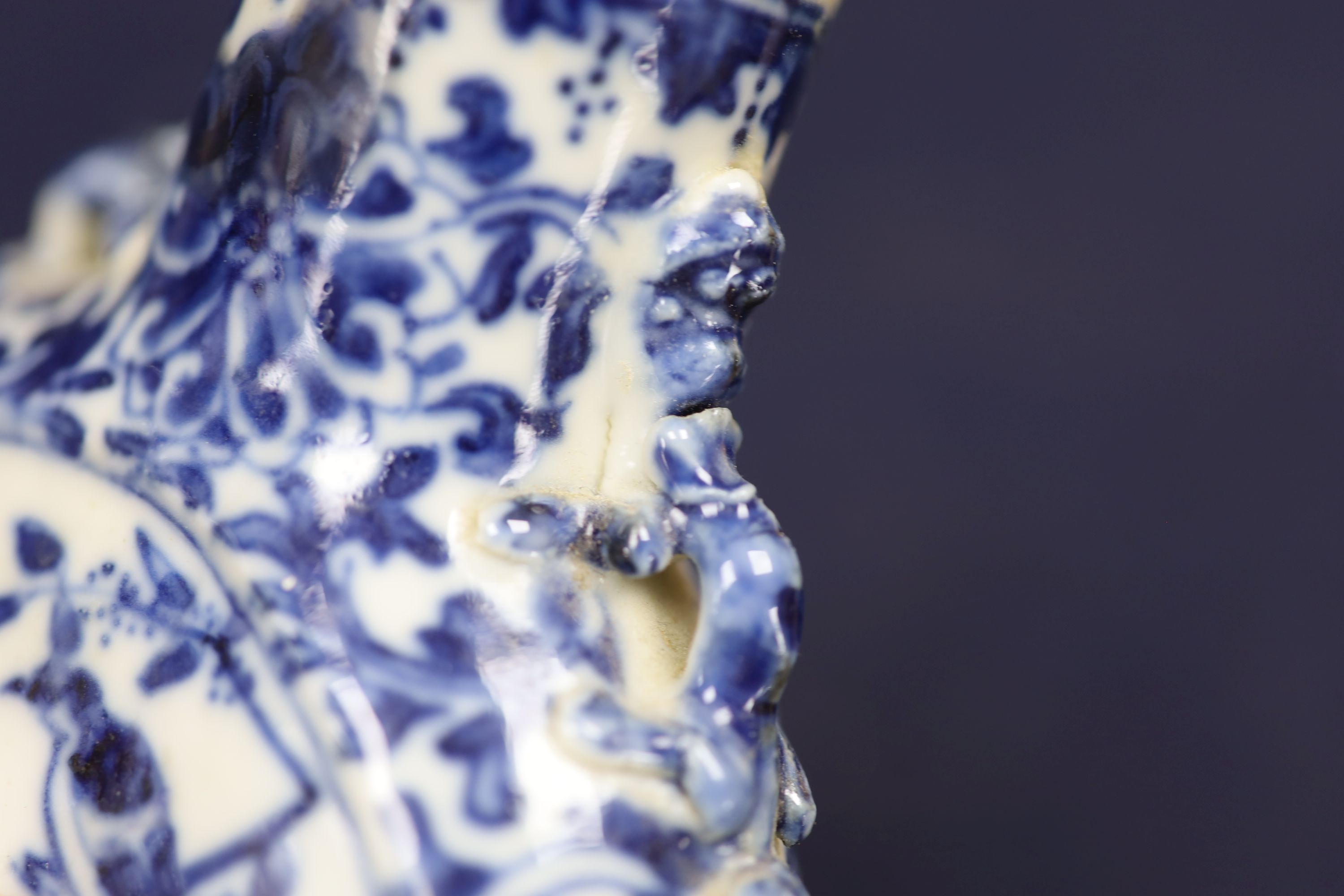 Two 19th century Chinese blue and white moon flasks and a teapot, tallest 21cm